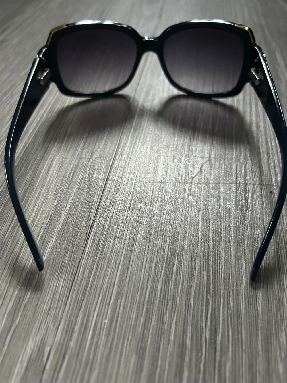Curations Women’s Blue sunglasses with gold-tone corner accents